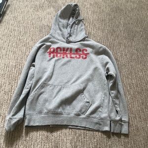 Grey with red art on front, hoodie size medium, in great condition.